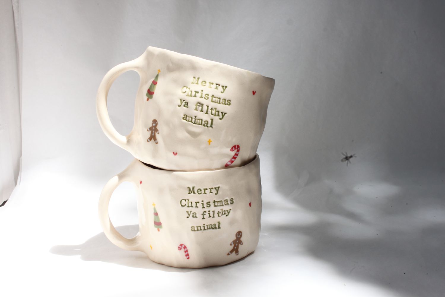 Merry Christmas ya filthy animal Mug