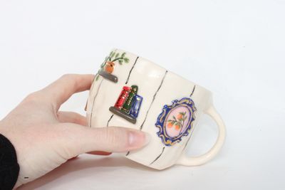Gallery Mug - plant and bookshelves