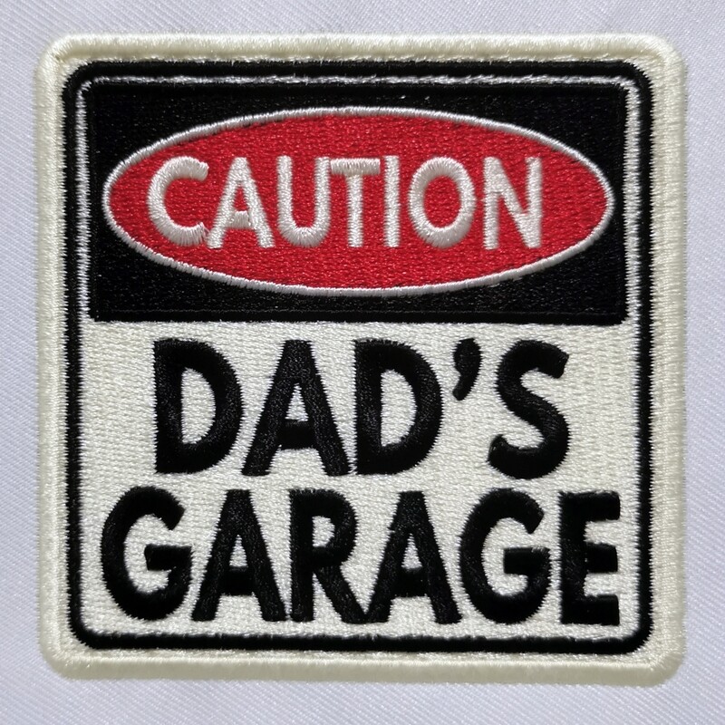 Dad&#39;s Garage with Caution Sign