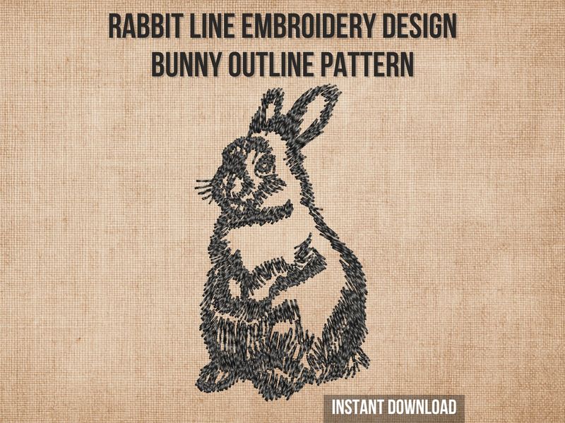 Black line embroidery of a rabbit sitting upright with detailed fur texture and expressive eyes on a light fabric background.
