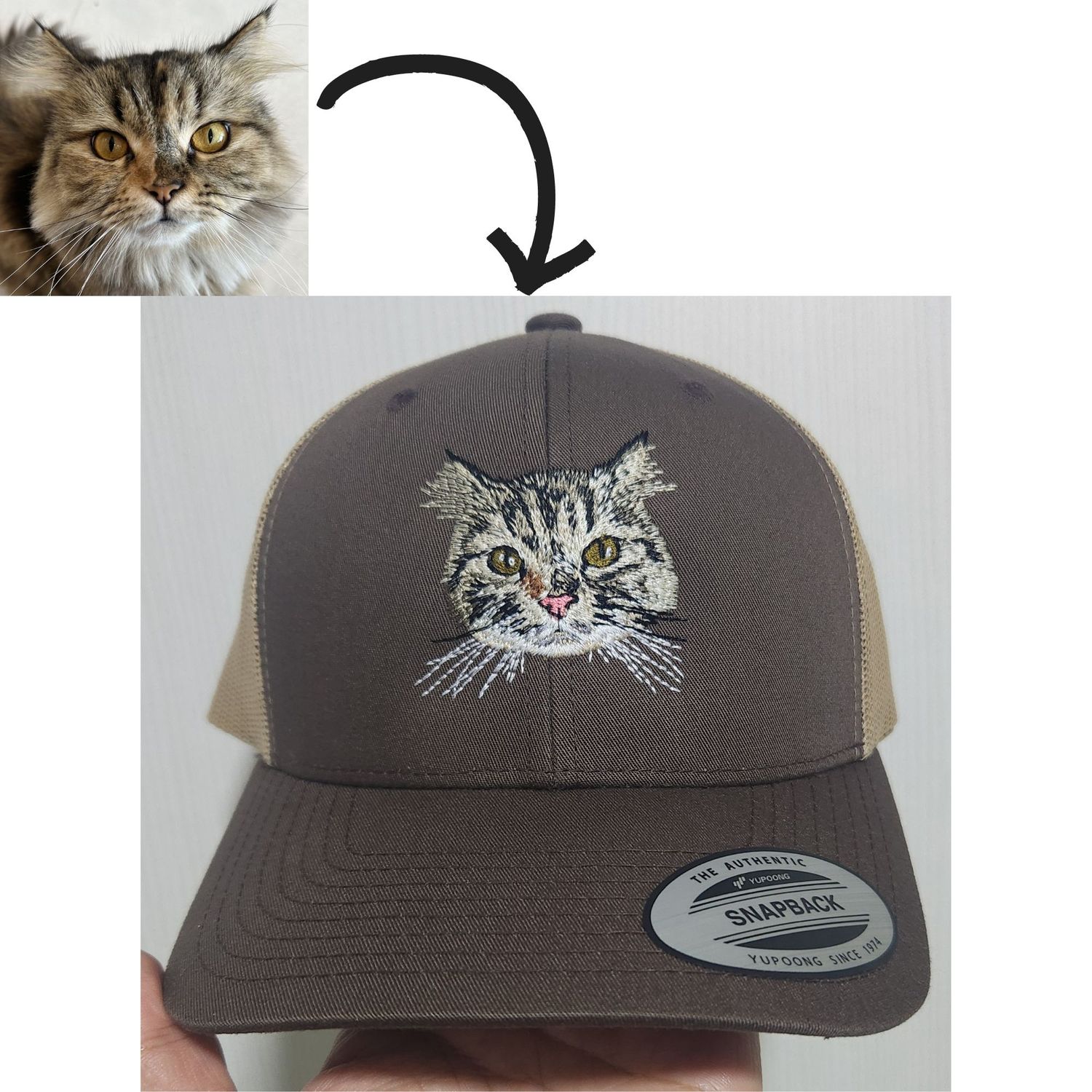 Charcoal and khaki trucker hat embroidered with a realistic tabby cat face based on a photo of a pet cat.