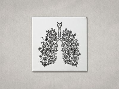 Detailed black embroidered anatomical lungs with flowers on white gallery-wrapped canvas. Minimalist grey wall background.