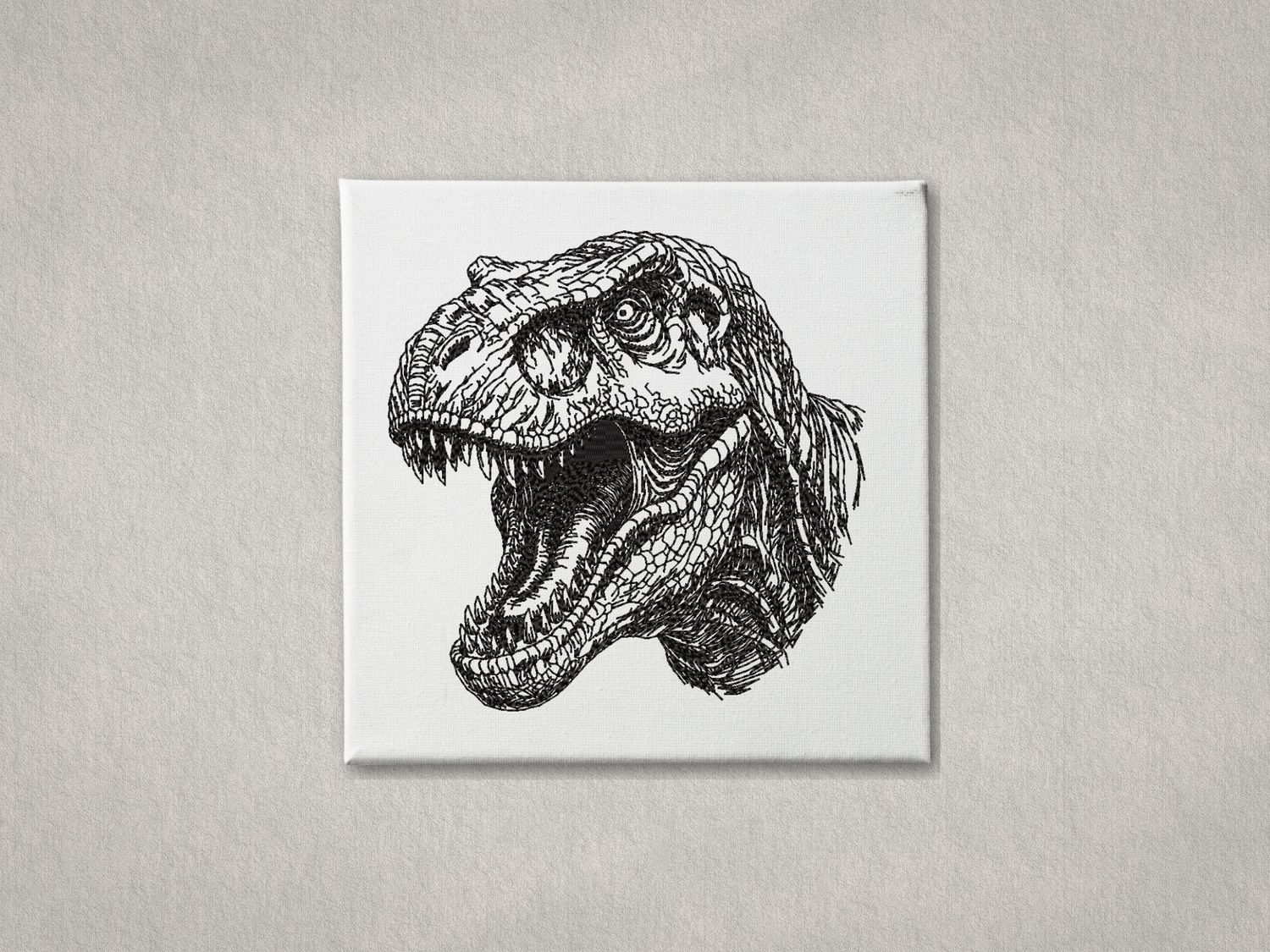Detailed black embroidered T-Rex head on white gallery-wrapped canvas. Minimalist grey textured wall background.