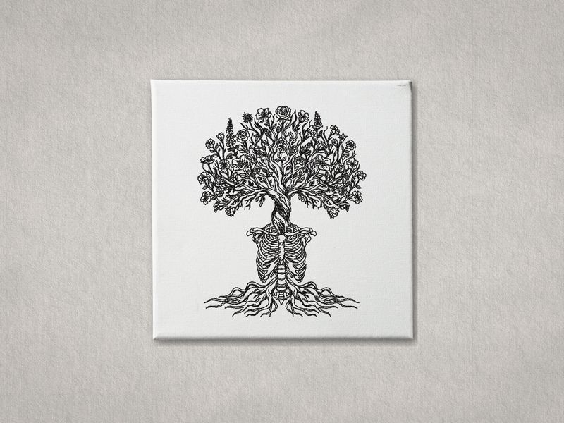 Intricate embroidered skeleton tree of life on a white gallery-wrapped canvas. Centered against a textured grey background.