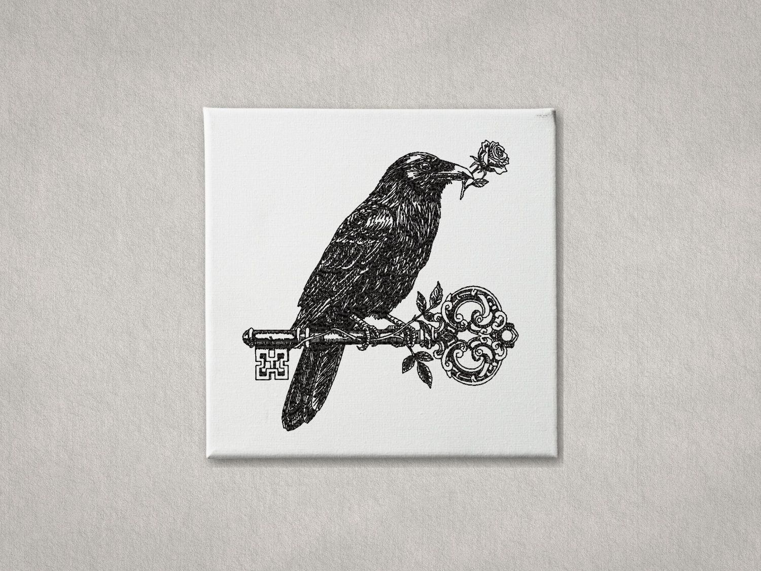 Black embroidered crow perched on a vintage key with a rose, on white gallery-wrapped canvas. Minimalist grey background.