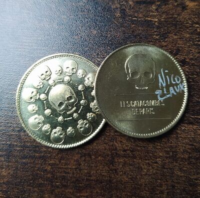 Catacomb coin signed by Nico Claux