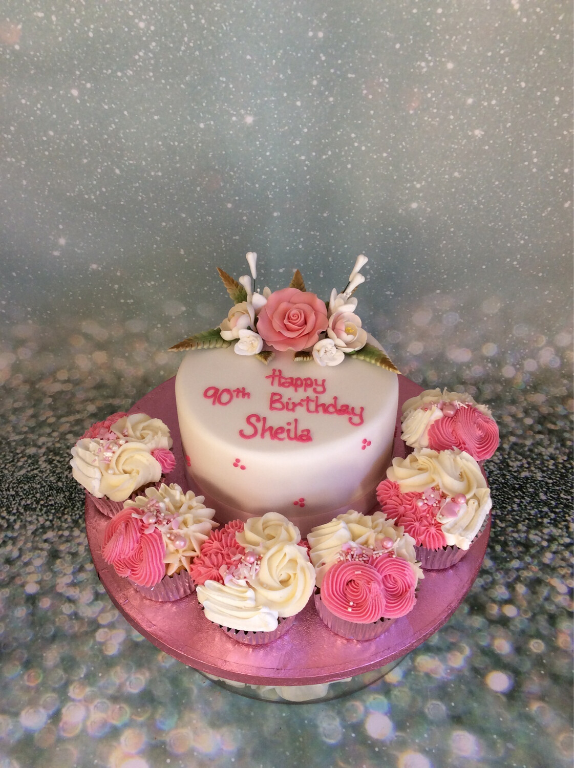 Flower Spray With Cupcakes On Board