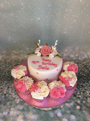 Flower Spray With Cupcakes On Board