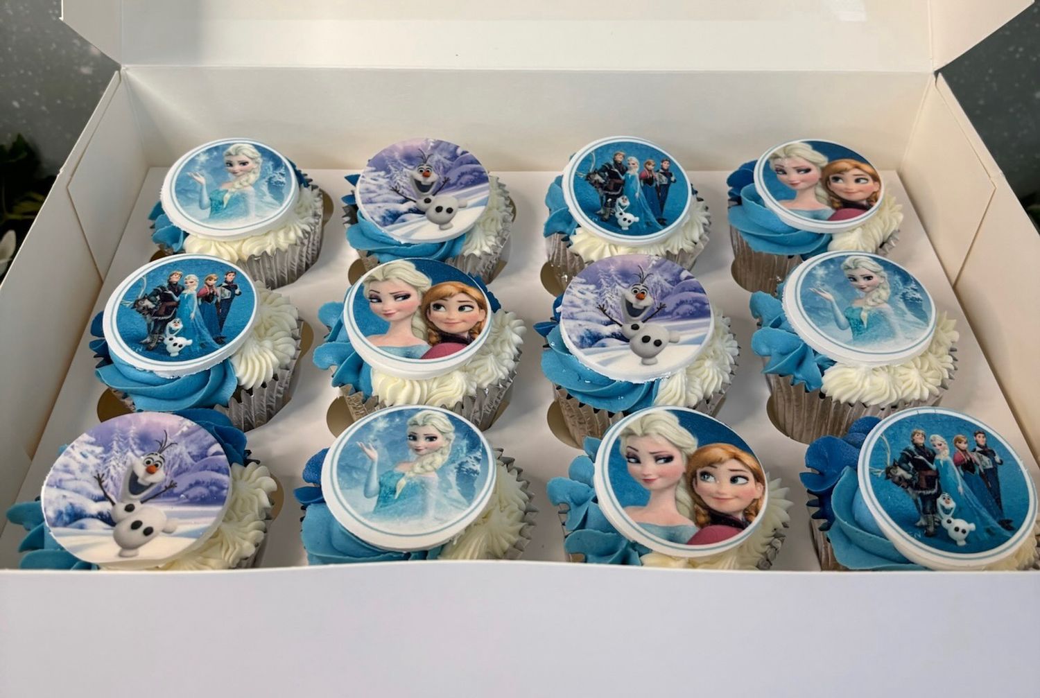 Frozen Cupcakes With Cream &amp; Blue Frosting