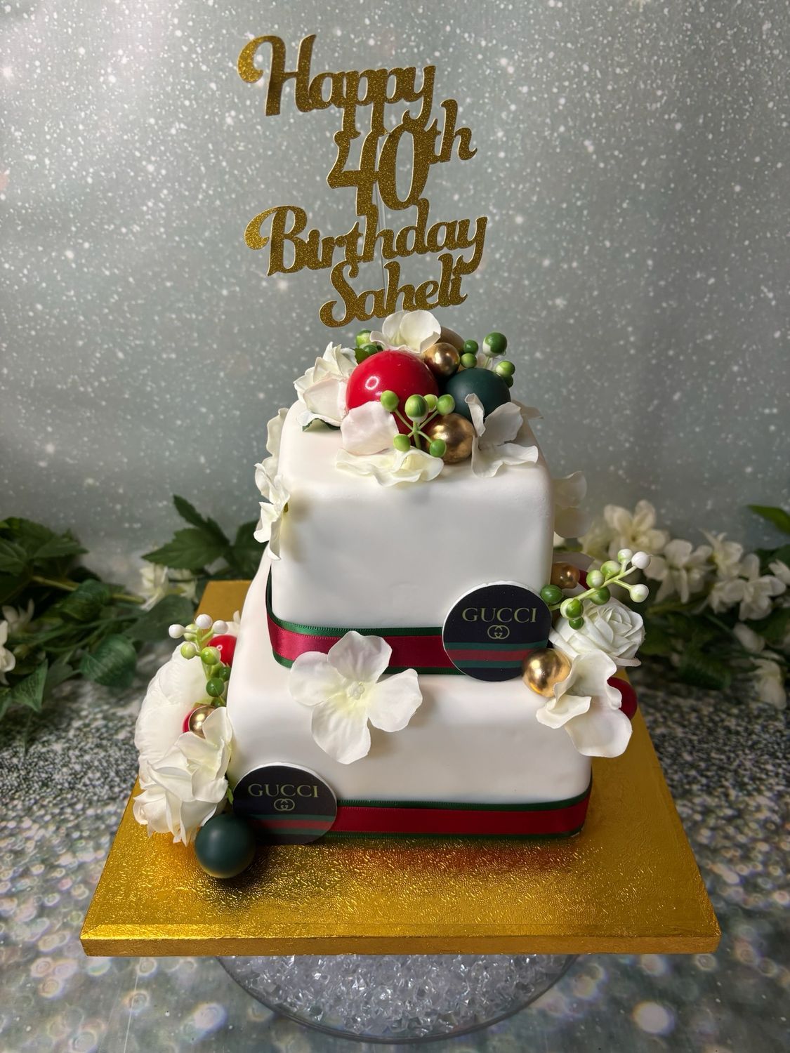 2 Tier With Silk Flowers And Gucci Logo