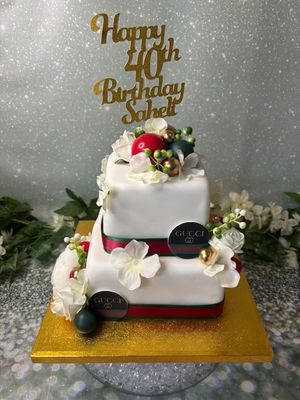 2 Tier With Silk Flowers And Gucci Logo