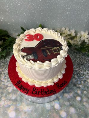 Guitar Themed Frosting Cake