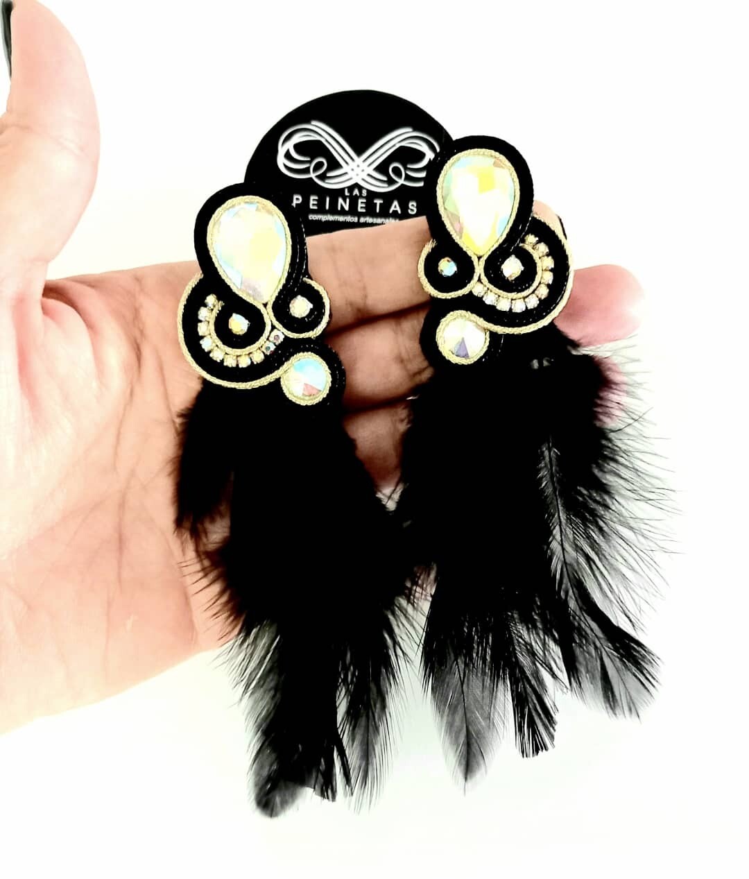 Pendientes plumas