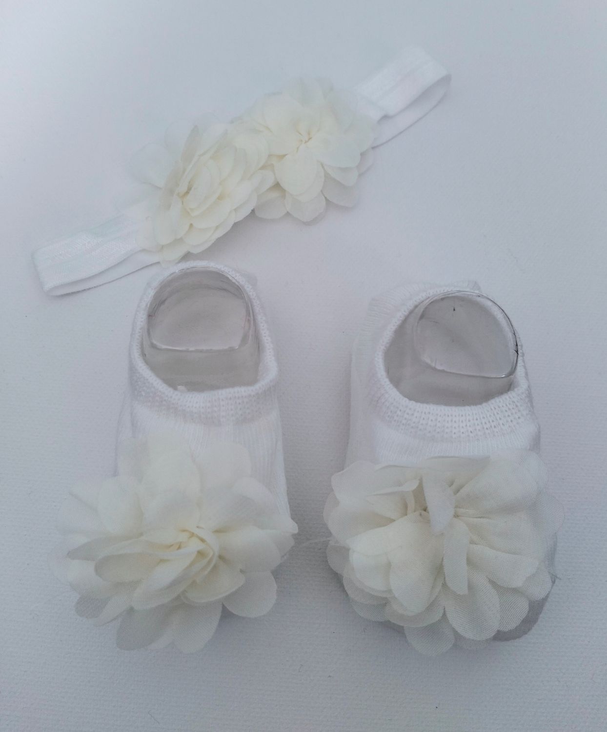 Calcetines y diadema. 0 a 6 M
