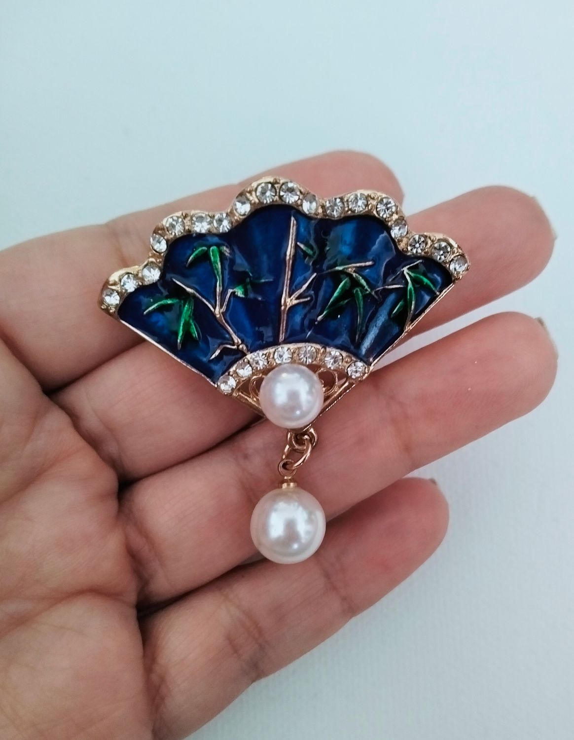 Broche azul