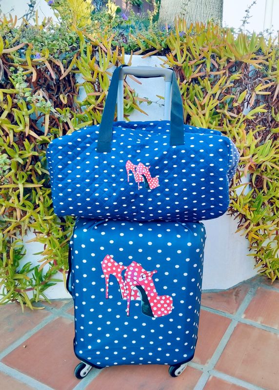 Funda de maleta con bolso a juego