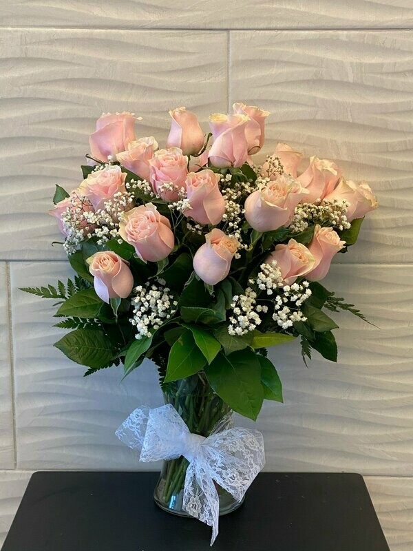 Two Dozen Roses in a Vase