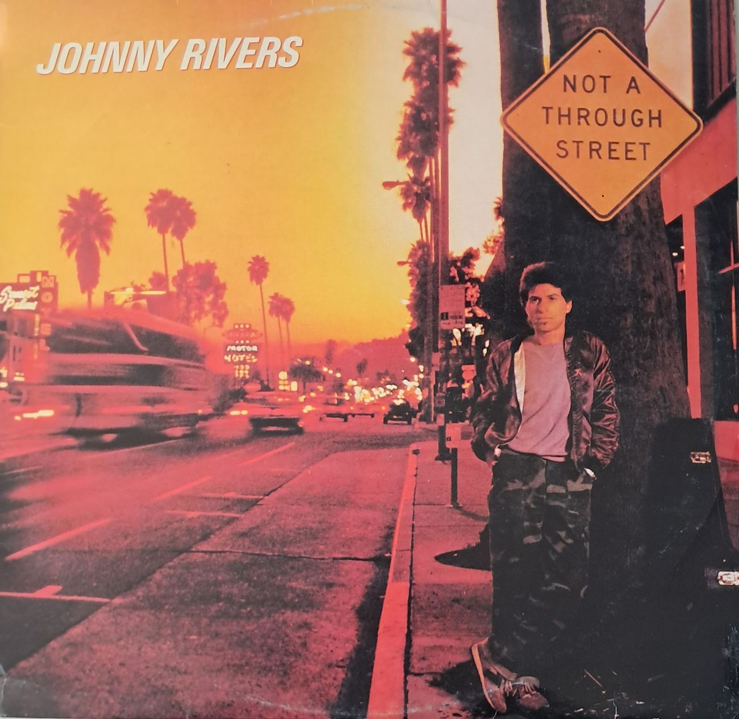Johnny Rivers – Not A Through Street (1983)