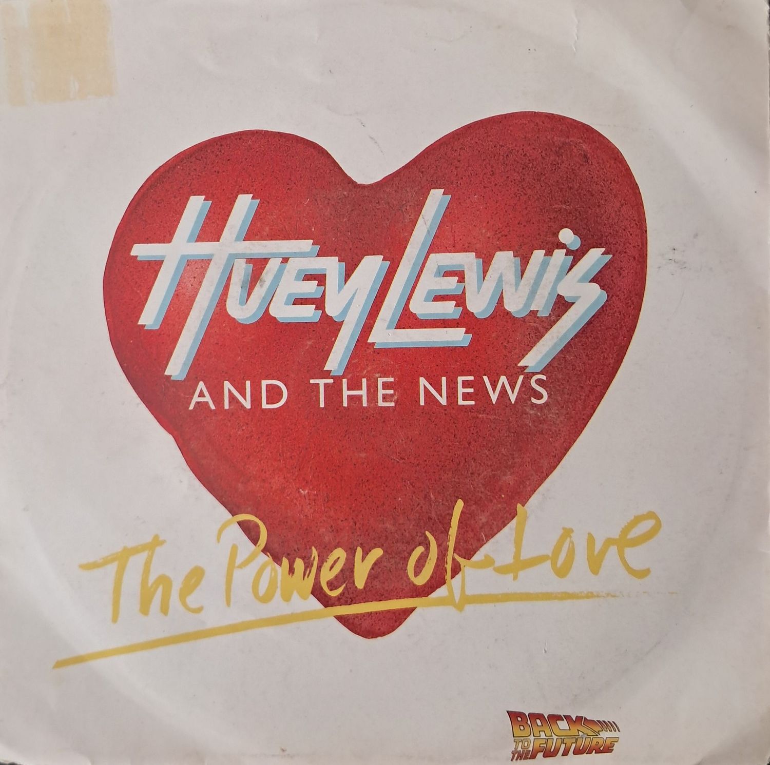 Huey Lewis & The News – The Power Of Love / Bad Is Bad (7" Single) (1985)