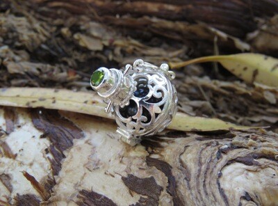 Sterling Silver Peridot Harmony Ball Pendant with Black Chime Ball HB-472