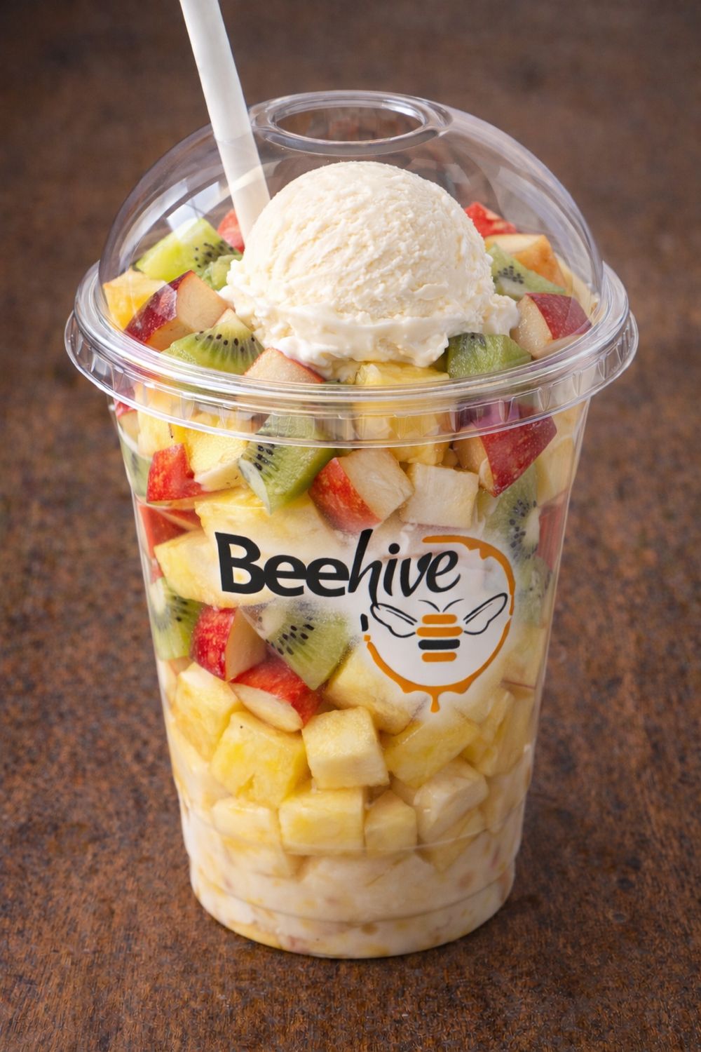 Fruit parfait with muesli, ice cream, or yoghurt