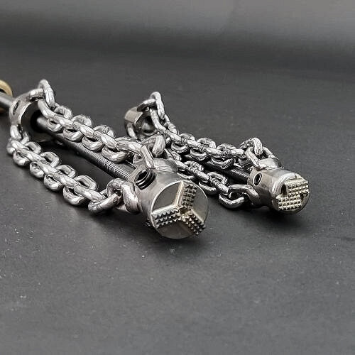 Heavy-duty Plain Chain With Croco Drill Head (PVC) is a tiger chain attached to a flex shaft and powered by a corded or cordless power drill