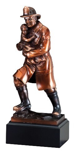 Fireman carrying child