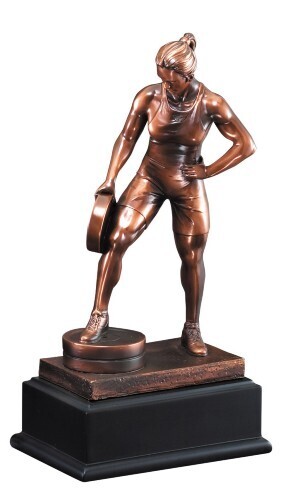 Woman with barbell in hand