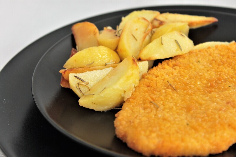 Cotoletta con patate al forno