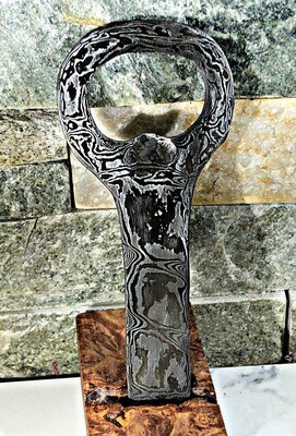 Damascus bottle opener- 65 layers hand forged