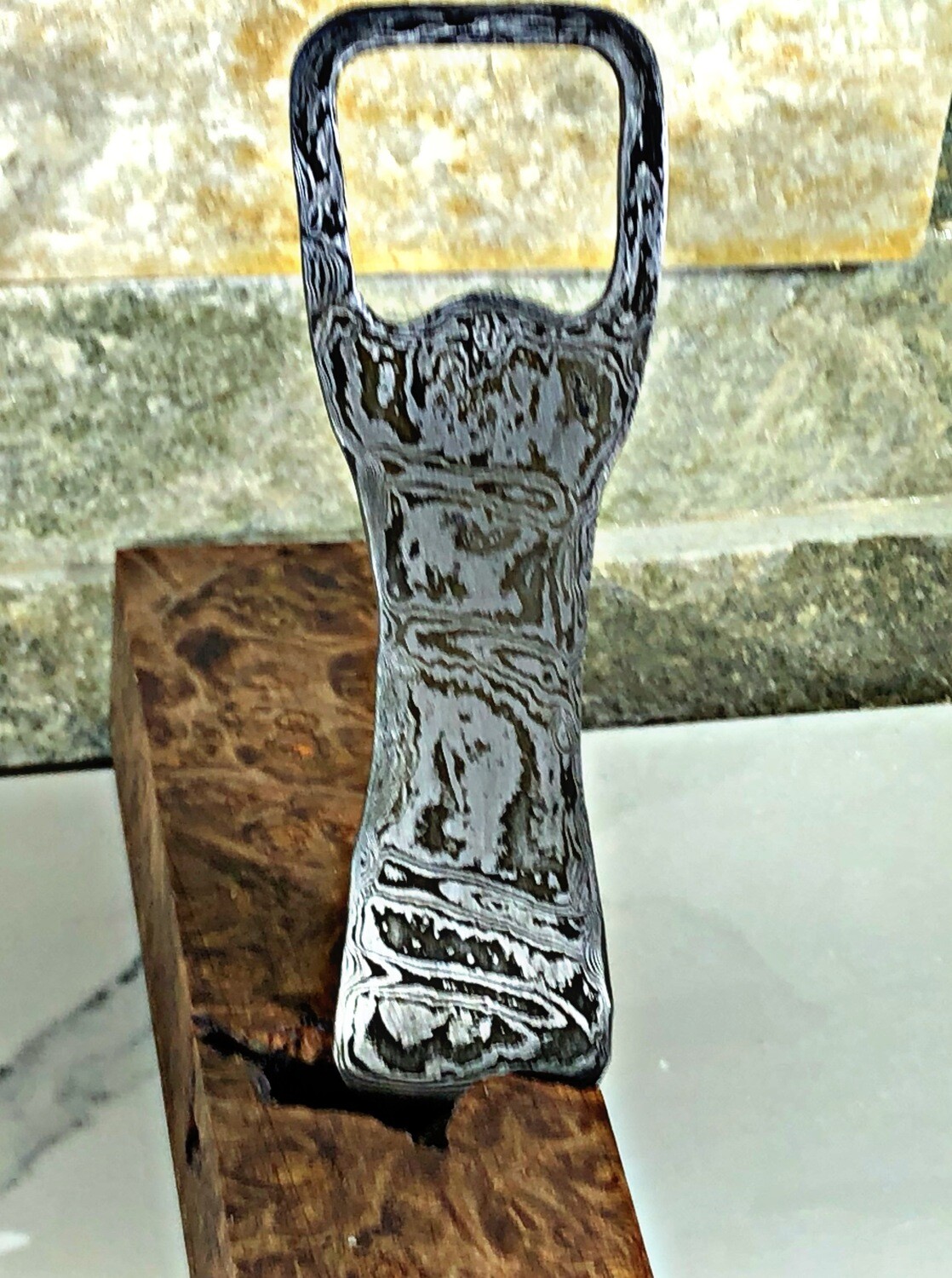 Damascus bottle opener- 65 layers hand forged