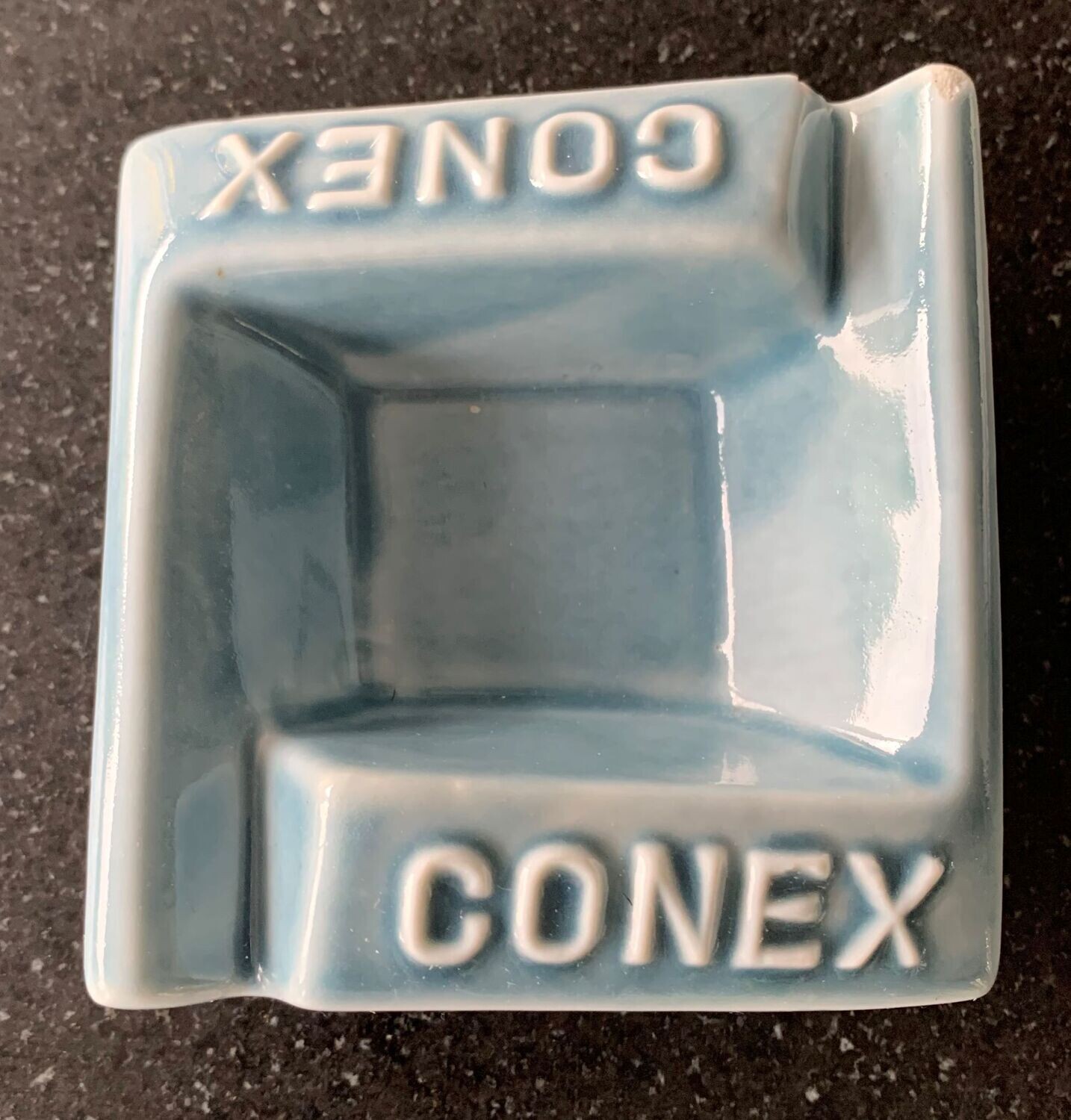 Porseleinen reclame-asbak CONEX