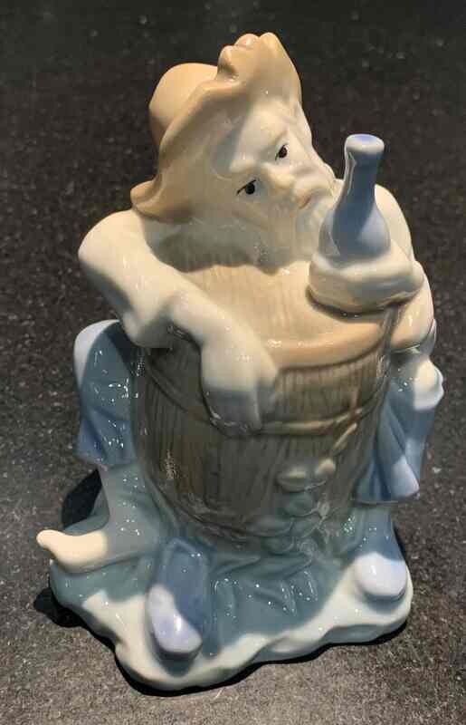 ​Porcelain figurine of drunken pirate