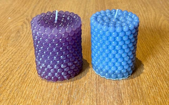 Pair of Pearls Candles blue and purple.