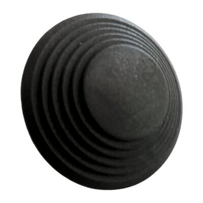 Round Black molded plastic part with six stepped equal tiers the top tier being about half the diameter of the base  