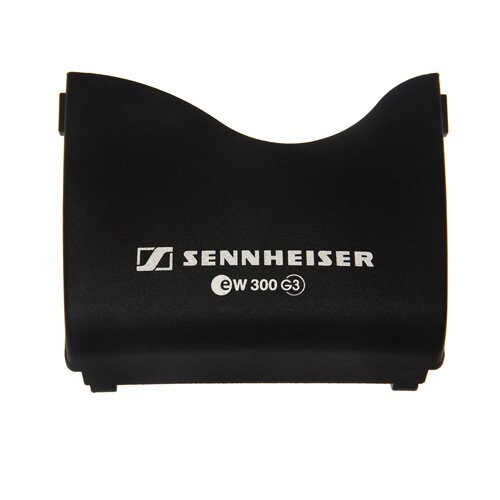 Sennheiser black molded battery compartment curved flap cover with side lock bars for a wireless EW300 G3 bodypack on white