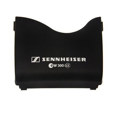 Sennheiser black molded battery compartment curved flap cover with side lock bars for a wireless EW300 G3 bodypack on white