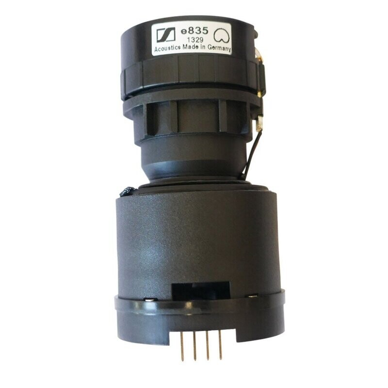 Black Sennheiser mic capsule encased in a housing labelled e835 with four contact pins for XSW microphone on white background