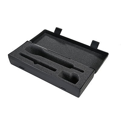 Sennheiser open hard black plastic case with internal foam with cut-outs for SKM9000 mic and accessories on white background