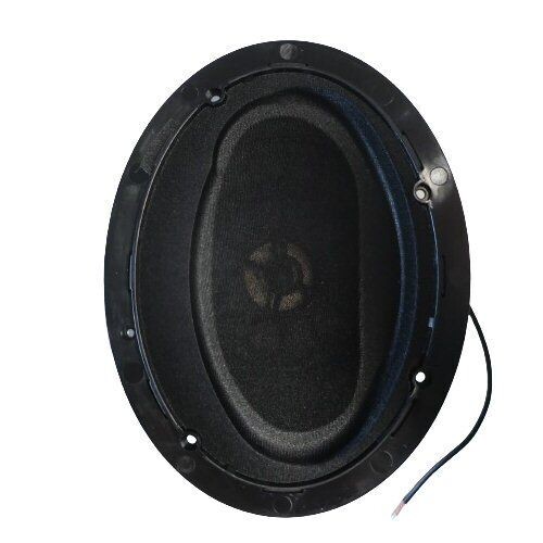 Black oval molded plastic housing with central loudspeaker and baffle with holes at various points for affixing and one cable