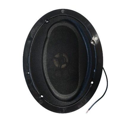 Black oval molded plastic housing with central loudspeaker and baffle with holes at various points for affixing and one cable