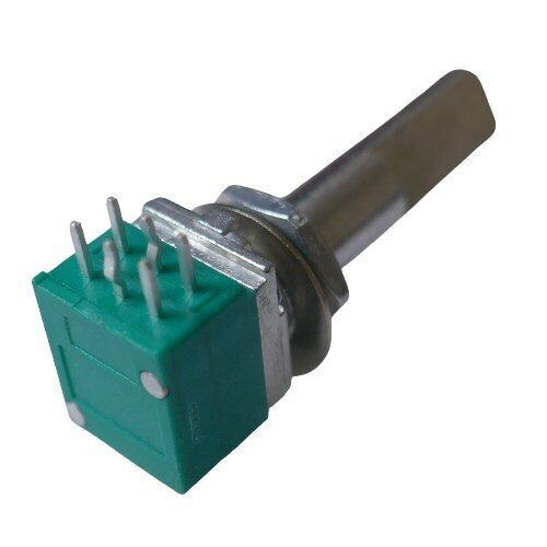 solder tags on top of a square edged green plastic case with a slotted metal shaft variable potentiometer 