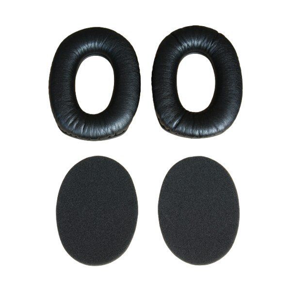 One pair ear black cushions with foam infills below on a white background