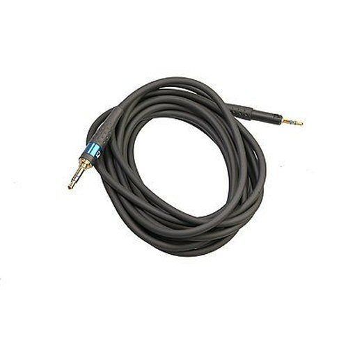 Headphone connecting cable straight black, stored in a coil, with audio jack plugs at either end on…