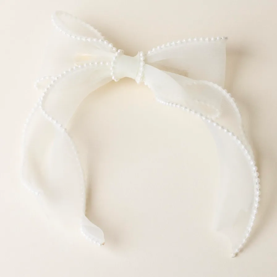 The Darling Effect Sheer Bow