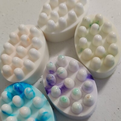 Massaging soap bars