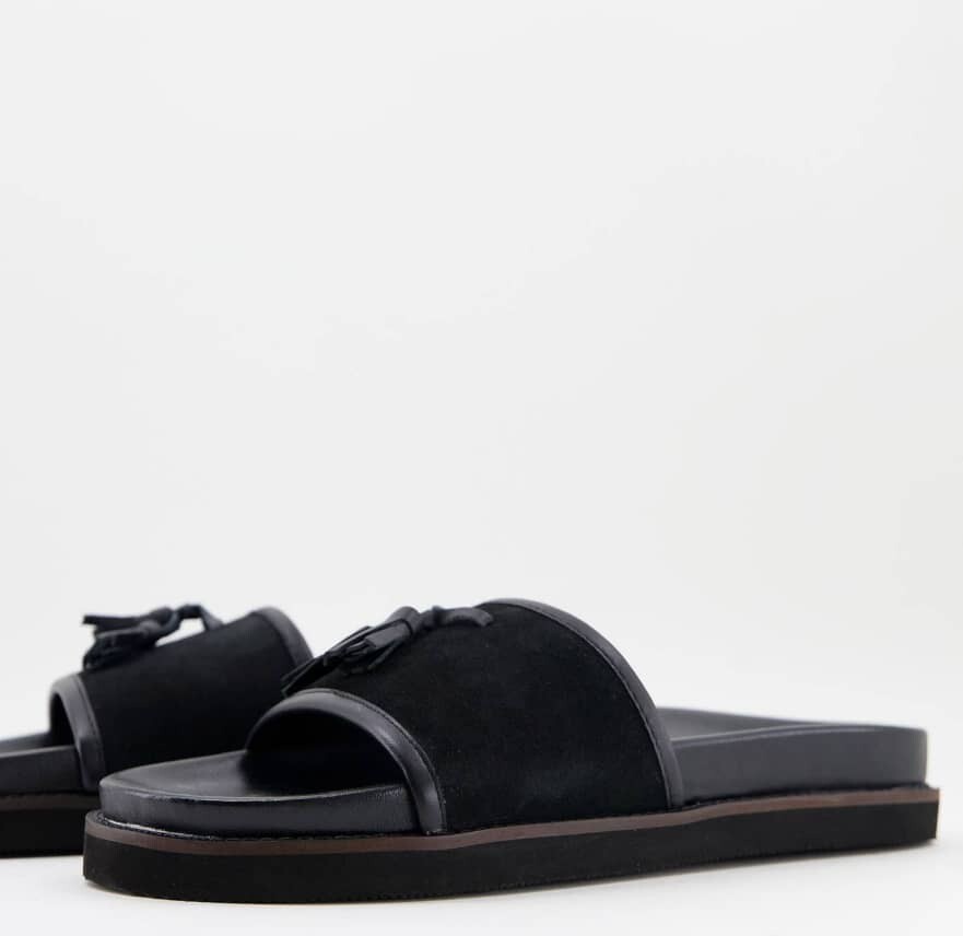 WALK LONDON RONNY TASSEL SLIDER SANDALS IN BLACK SEUDE