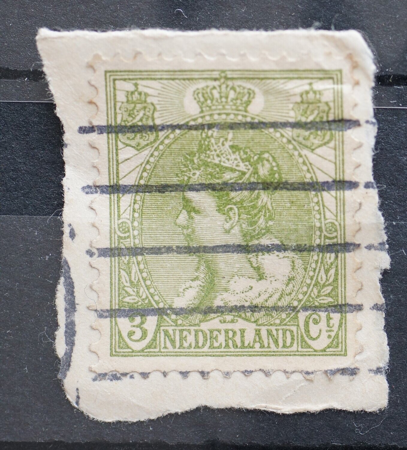 plaatfout NVPH 57: groene stip in haar (voorzijde)