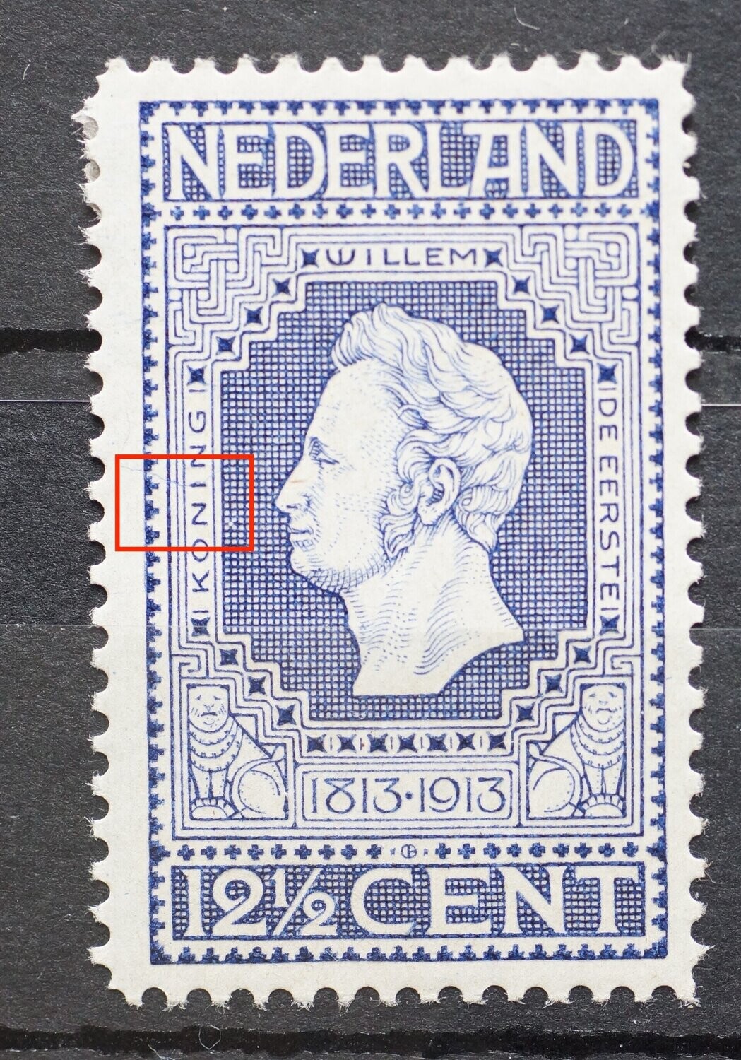 NVPH 94 - blauw kronkelend lijntje, witte stip in arcering