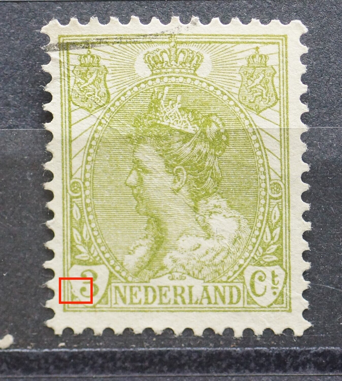 NVPH 57 - beschadiging waardeschild, links